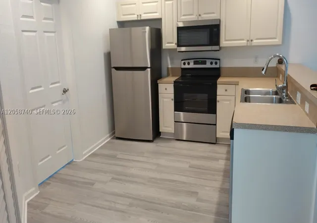 Photo 1 of Condo for sale at 1960 Freeport Ln #1960, Riviera Beach, FL 33404 | MLS# A12058740 | Listing updated on 2026-09-11