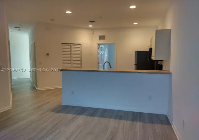 Photo 3 of Condo for sale at 1960 Freeport Ln #1960, Riviera Beach, FL 33404 | MLS# A12058740 | Listing updated on 2026-09-11