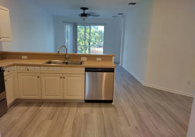 Photo 4 of Condo for sale at 1960 Freeport Ln #1960, Riviera Beach, FL 33404 | MLS# A12058740 | Listing updated on 2026-09-11