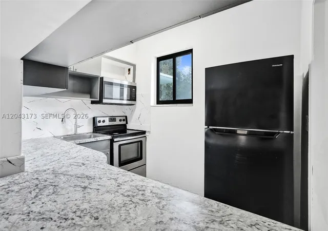 Photo 2 of Multi family home for sale at 1400 Ne 148th St, Miami, FL 33161 | MLS# A12043173 | Listing updated on 2026-09-01