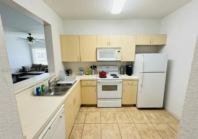 Listing Photo 4 - Condo for sale in building located at 1169 Golden Lakes Blvd, Royal Palm Beach, FL 33411 - Unit #1123