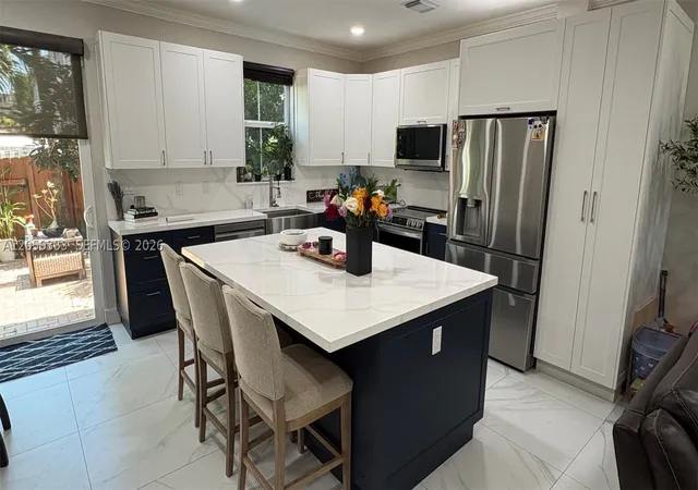 Photo 3 of Townhouse for sale at 11623 Nw 78th St, Doral, FL 33178 | MLS# A12059333 | Listing updated on 2026-09-10