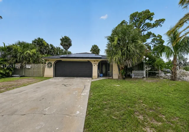 Photo 1 of Single family home for sale at 1041 Sanger Street, Port Charlotte, FL 33952 | MLS# A12057357 | Listing updated on 2026-09-05