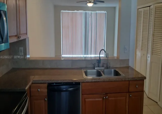 Listing Photo 4 - Condo for sale in First Moorings Condo located at 1591 Ne Miami Gdns Dr, Miami, FL 33179 - Unit #205
