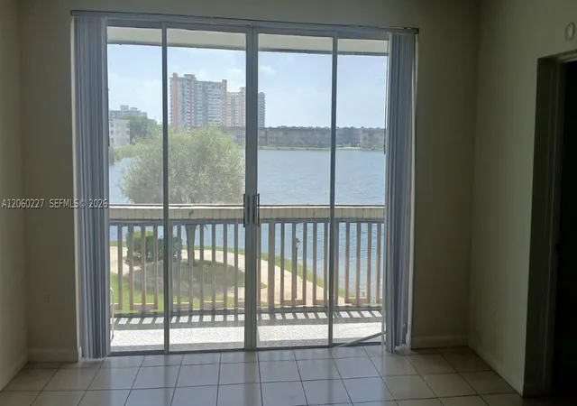 Listing Photo 5 - Condo for sale in First Moorings Condo located at 1591 Ne Miami Gdns Dr, Miami, FL 33179 - Unit #205