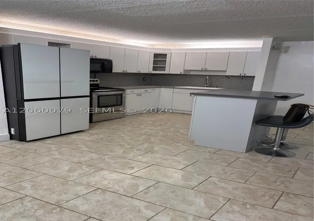 Photo 1 of Condo for sale at 14850 Naranja Lakes Blvd #B3F, Homestead, FL 33032 | MLS# A12060079 | Listing updated on 2026-09-16