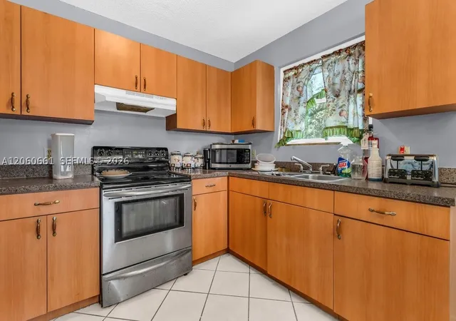 Photo 3 of Single family home for sale at 12231 Sw 202nd St, Miami, FL 33177 | MLS# A12060661 | Listing updated on 2026-08-29