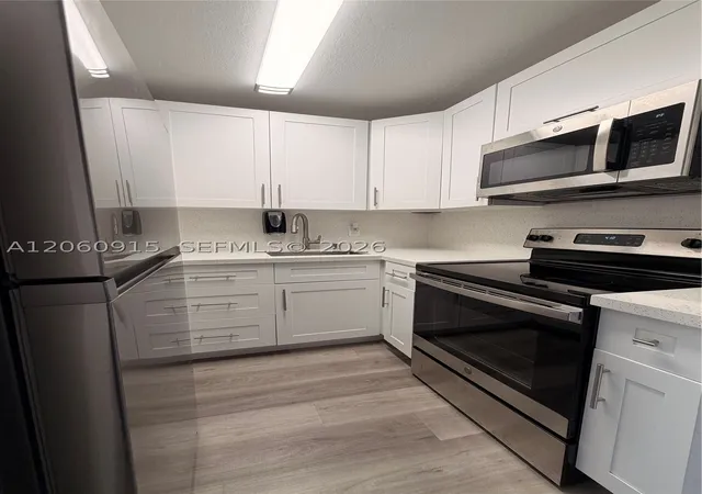 Photo 2 of Condo for sale at 5050 Nw 7th St #511, Miami, FL 33126 | MLS# A12060915 | Listing updated on 2026-08-30