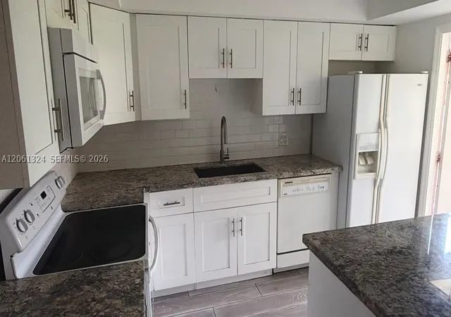 Photo 3 of Townhouse for sale at 11858 E Brier Patch Ct E, Wellington, FL 33414 | MLS# A12061324 | Listing updated on 2026-09-15