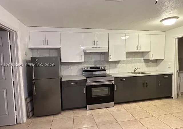 Photo 2 of Multi family home for sale at 236 Nw 9th Ave, South Bay, FL 33493 | MLS# A12061358 | Listing updated on 2026-09-04