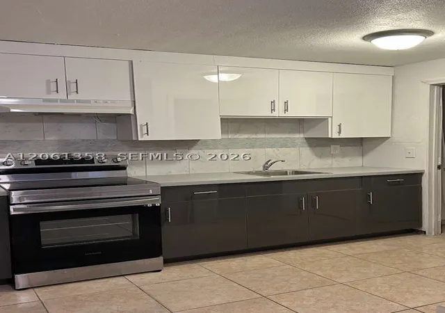 Photo 3 of Multi family home for sale at 236 Nw 9th Ave, South Bay, FL 33493 | MLS# A12061358 | Listing updated on 2026-09-04