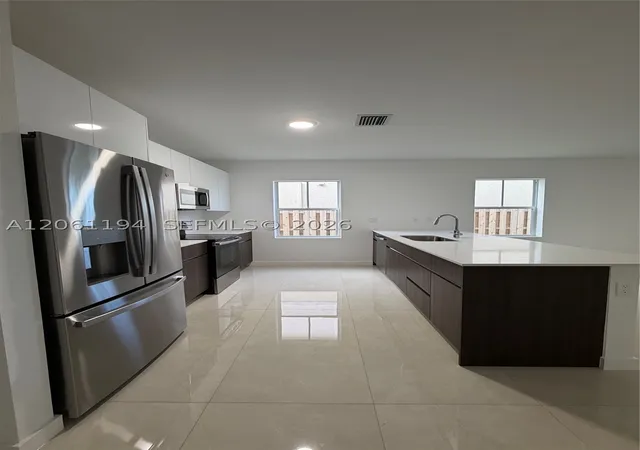 Photo 3 of Townhouse for sale at 27350 Sw 133rd Path, Homestead, FL 33032 | MLS# A12061194 | Listing updated on 2026-09-12