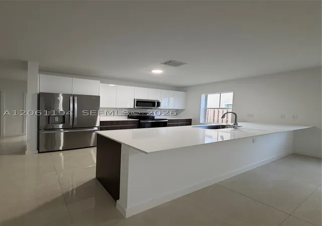 Photo 3 of Townhouse for sale at 27350 Sw 133Rd Path, Homestead, FL 33032 | MLS# A12061194 | Listing updated on 2026-09-12