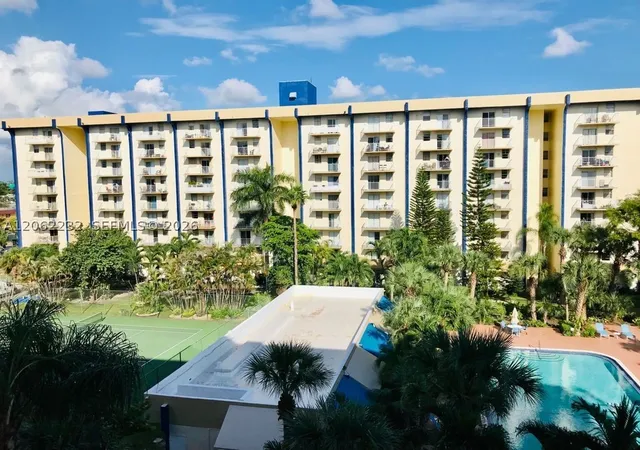 Listing Photo 1 - Condo for sale in building located at 4550 Nw 9Th St, Miami, FL 33126 - Unit #706E