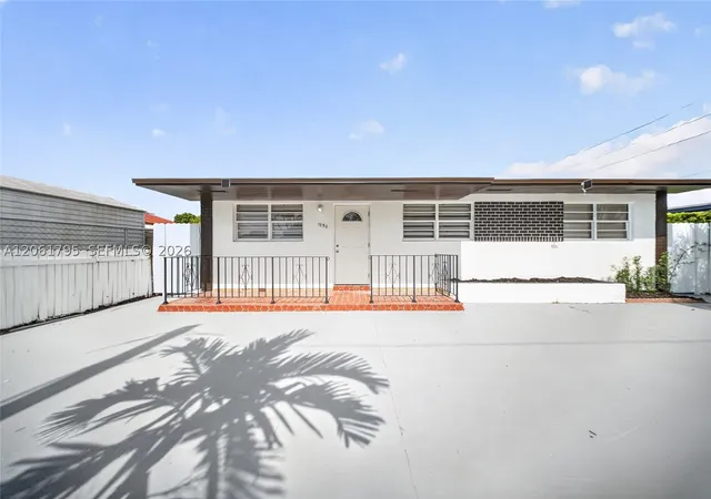 Photo 1 of Multi family home for sale at 1055 Nw 32nd Ct, Miami, FL 33125 | MLS# A12061795 | Listing updated on 2026-10-07
