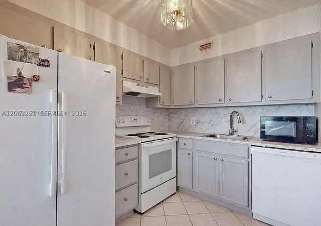 Listing Photo 2 - Condo for sale in building located at 13450 Sw 3Rd St, Pembroke Pines, FL 33027 - Unit #408D