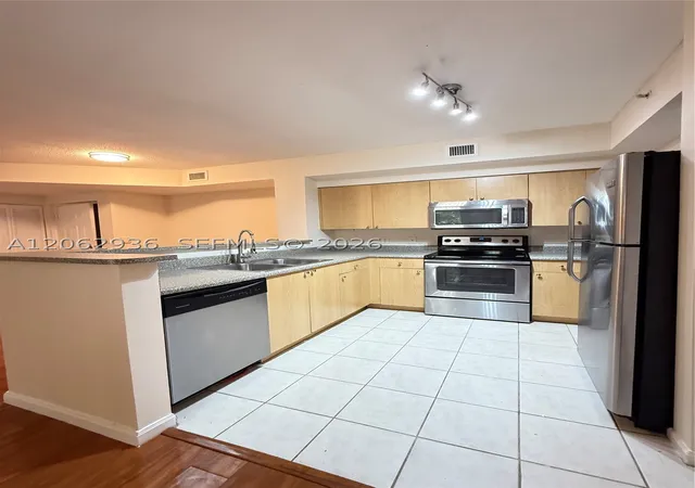 Photo 2 of Condo for sale at 7940 N Nob Hill Rd #204, Tamarac, FL 33321 | MLS# A12062936 | Listing updated on 2026-09-16