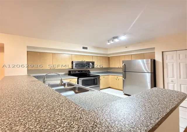 Photo 3 of Condo for sale at 7940 N Nob Hill Rd #204, Tamarac, FL 33321 | MLS# A12062936 | Listing updated on 2026-09-16