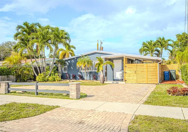 Photo 2 of Single family home for sale at 801 Ne 57th St, Oakland Park, FL 33334 | MLS# A12063039 | Listing updated on 2026-09-13