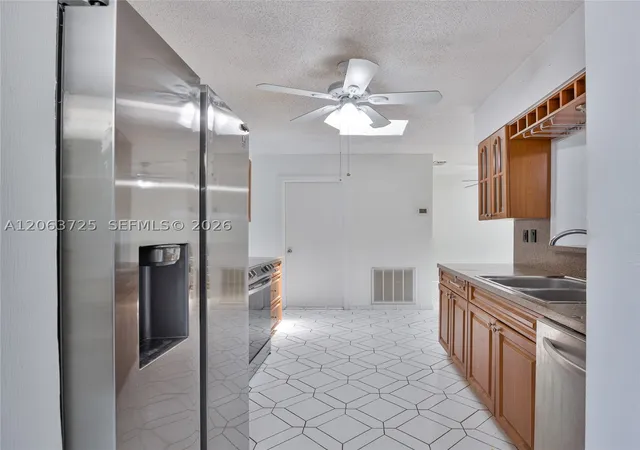 Photo 3 of Single family home for sale at 7100 Nw 66th Ter, Tamarac, FL 33321 | MLS# A12063725 | Listing updated on 2026-10-06