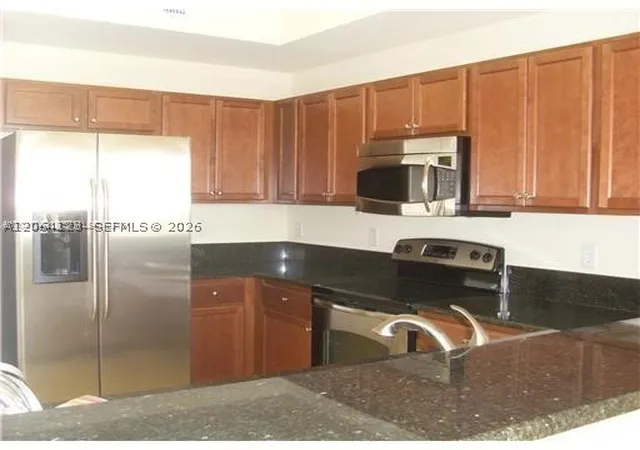Photo 2 of Sale Pending at 11501 Nw 89th St #105, Doral, FL 33178 | MLS# A12064123 | Listing updated on 2026-09-03
