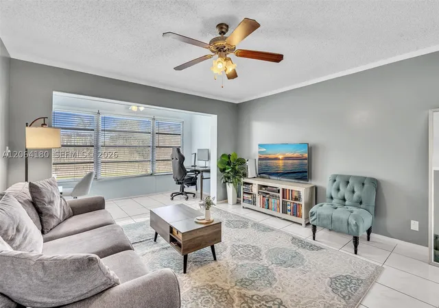 Photo 1 of Condo for sale at 8852 W Mcnab Rd #203, Tamarac, FL 33321 | MLS# A12064180 | Listing updated on 2026-09-12