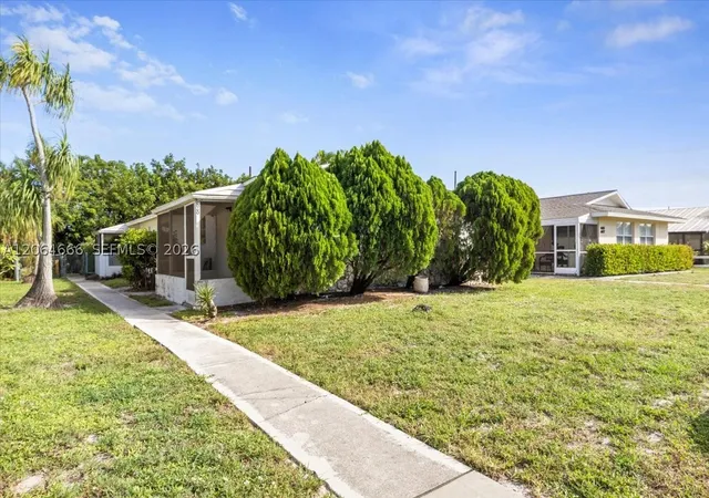 Photo 2 of Multi family home for sale at 681/683 95th Ave N, Naples, FL 34108 | MLS# A12064666 | Listing updated on 2026-10-07