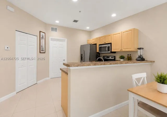 Photo 2 of Sale Pending at 1993 Marsh Harbor Dr, Riviera Beach, FL 33404 | MLS# A12064725 | Listing updated on 2026-09-08