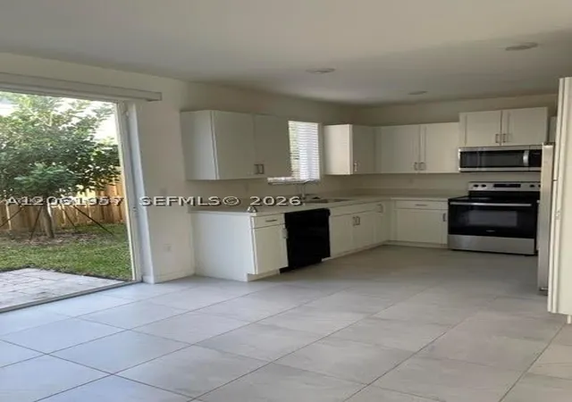 Photo 2 of Townhouse for sale at 2435 Se 11th St, Homestead, FL 33035 | MLS# A12061957 | Listing updated on 2026-08-26