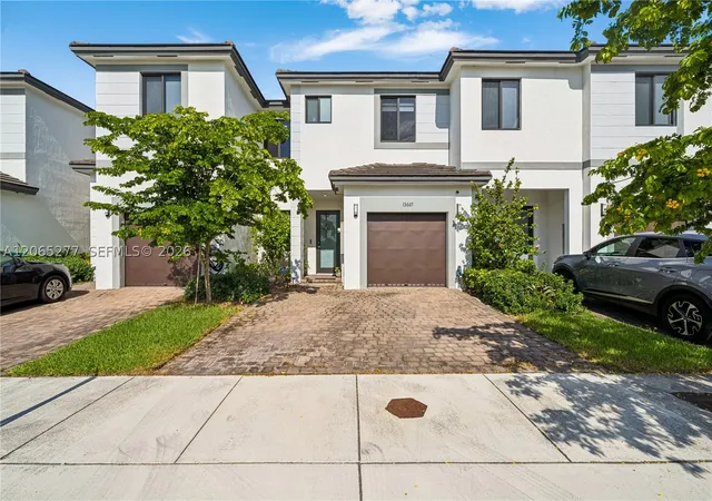 Photo 1 of Townhouse for sale at 13667 Sw 157th Ct, Miami, FL 33196 | MLS# A12065277 | Listing updated on 2026-09-01