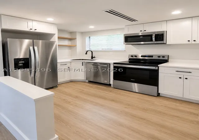 Photo 3 of Multi family home for sale at 1244 Nw 32nd St, Miami, FL 33142 | MLS# A12055496 | Listing updated on 2026-09-12