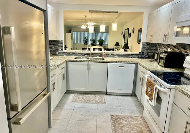 Photo 2 of Condo for sale at 2901 N Nob Hill Rd #107, Sunrise, FL 33322 | MLS# A12063849 | Listing updated on 2026-09-12
