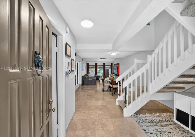 Photo 3 of Townhouse for sale at 8703 Cleary Blvd, Plantation, FL 33324 | MLS# A12065399 | Listing updated on 2026-08-29