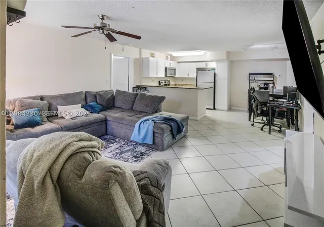 Photo 3 of Condo for sale at 831 Lyons Rd #23101, Coconut Creek, FL 33063 | MLS# A12064930 | Listing updated on 2026-09-04