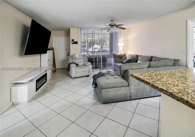 Photo 3 of Condo for sale at 831 Lyons Rd #23101, Coconut Creek, FL 33063 | MLS# A12064930 | Listing updated on 2026-09-04