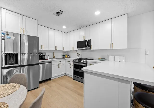 Photo 2 of Single family home for sale at 8921 Nw 26th Pl, Sunrise, FL 33322 | MLS# A12065771 | Listing updated on 2026-09-08