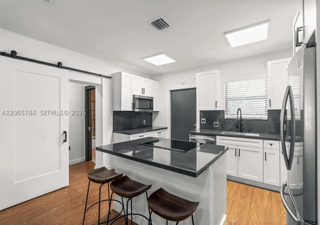 Photo 1 of Single family home for sale at 1121 Nw 57th St, Miami, FL 33127 | MLS# A12065784 | Listing updated on 2026-08-27