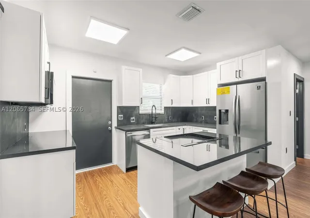 Photo 2 of Single family home for sale at 1121 Nw 57th St, Miami, FL 33127 | MLS# A12065784 | Listing updated on 2026-08-27