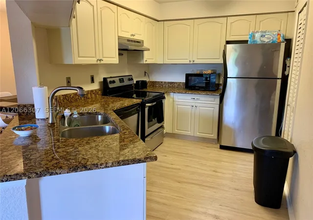 Photo 4 of Condo for sale at 2550 N Alafaya Trail #12203, Orlando, FL 32826 | MLS# A12066307 | Listing updated on 2026-09-01