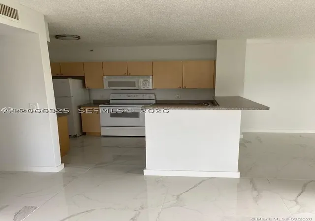 Photo 2 of Condo for sale at 7980 N Nob Hill Rd #102, Tamarac, FL 33321 | MLS# A12066325 | Listing updated on 2026-09-20