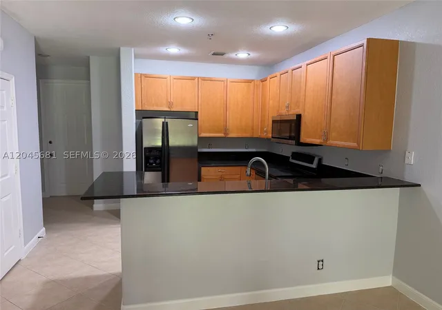 Photo 3 of Townhouse for sale at 7432 Willow Grove Pl, Davie, FL 33314 | MLS# A12045681 | Listing updated on 2026-09-14