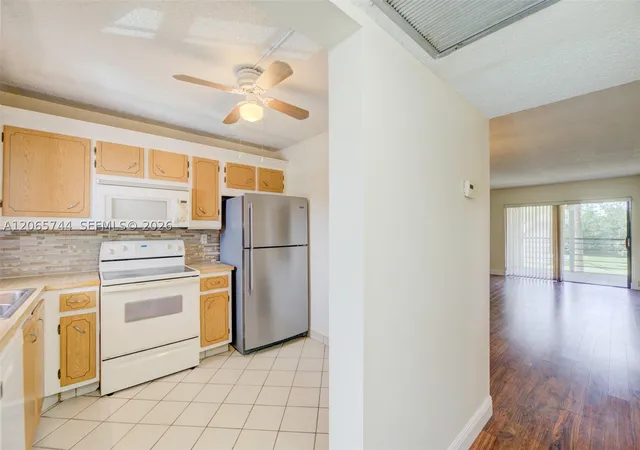 Photo 2 of Condo for sale at 9233 Sw 8th St #208, Boca Raton, FL 33428 | MLS# A12065744 | Listing updated on 2026-09-09