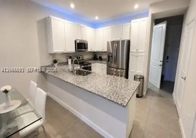 Photo 2 of Townhouse for sale at 10819 Sw 232nd Ter, Homestead, FL 33032 | MLS# A12066693 | Listing updated on 2026-09-14