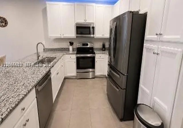 Photo 3 of Townhouse for sale at 10819 Sw 232nd Ter, Homestead, FL 33032 | MLS# A12066693 | Listing updated on 2026-09-14