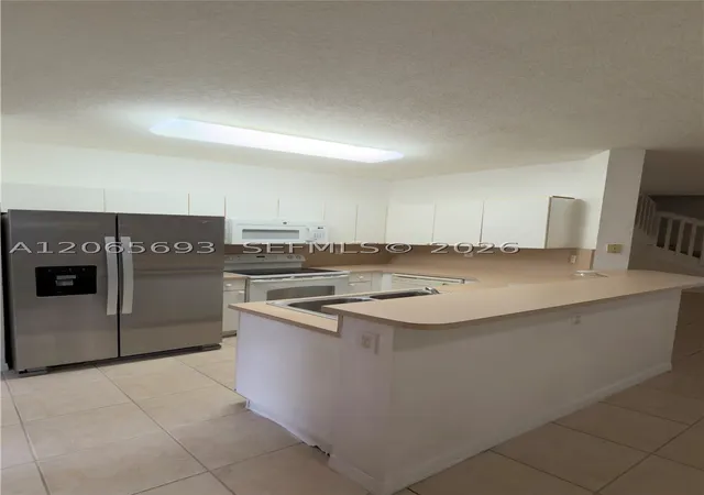 Photo 1 of Townhouse for sale at 8986 W Flagler St #6, Miami, FL 33174 | MLS# A12065693 | Listing updated on 2026-09-11