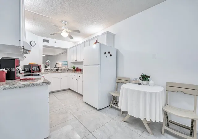 Photo 3 of Condo for sale at 23344 Carolwood Ln #201, Boca Raton, FL 33428 | MLS# A12066408 | Listing updated on 2026-10-05