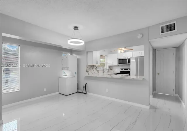 Photo 2 of Sale Pending at 3000 Nw 43rd Ter #106, Lauderdale Lakes, FL 33313 | MLS# A12064711 | Listing updated on 2026-09-11