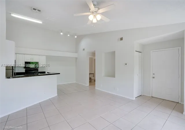 Photo 2 of Condo for sale at 9999 Summerbreeze Dr #409, Sunrise, FL 33322 | MLS# A12067297 | Listing updated on 2026-09-23