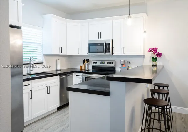 Photo 2 of Single family home for sale at 837 Nw 14th Way, Fort Lauderdale, FL 33311 | MLS# A12066766 | Listing updated on 2026-09-05