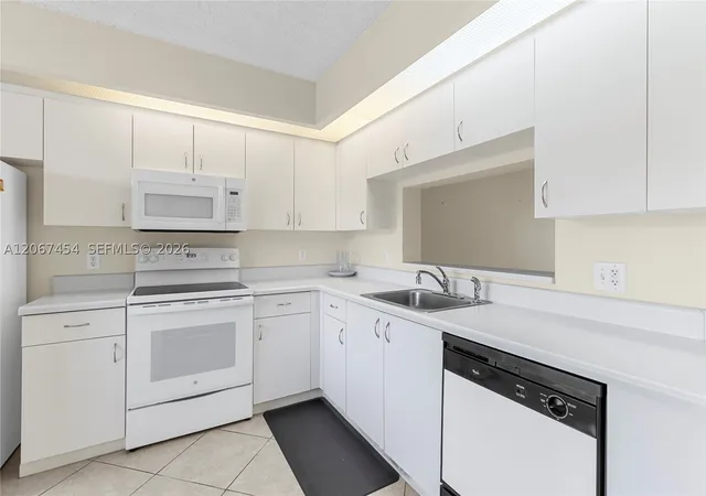 Photo 2 of Condo for sale at 13705 Sw 12th St #208B, Pembroke Pines, FL 33027 | MLS# A12067454 | Listing updated on 2026-09-11